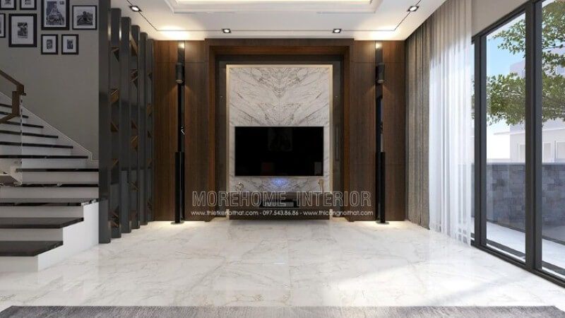 Trang trí phòng khách với đá trắng đối vân ốp tường đen cùng bố trí đối sánh giữa hai dàn loa dọc theo đường chiếu sáng từ mảng tường gỗ đẹp mắt.