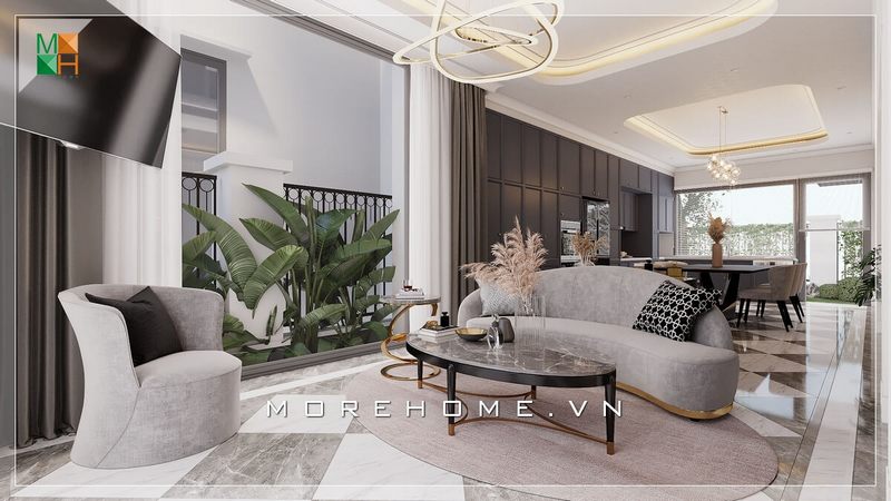 Một mẫu sofa bọc nỉ với những đường cong kiểu cách, tông màu ghi xám sang trọng, kết hợp bàn trà mặt đá chân sắt tĩnh điện và kệ trang trí kiểu cách, giúp tăng giá trị thẩm mỹ cho phòng khách của bạn